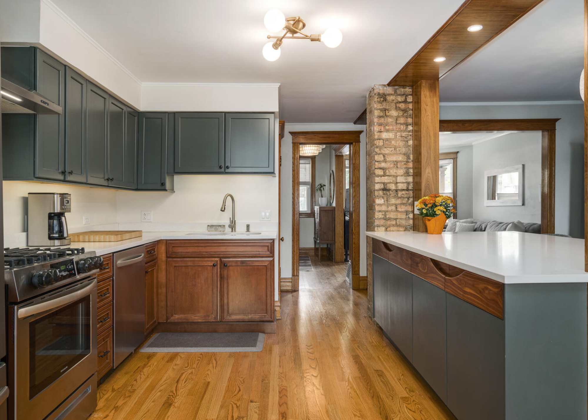 mid-century modern custom island sherwin williams color  painted cabinets by BradleyBuilt